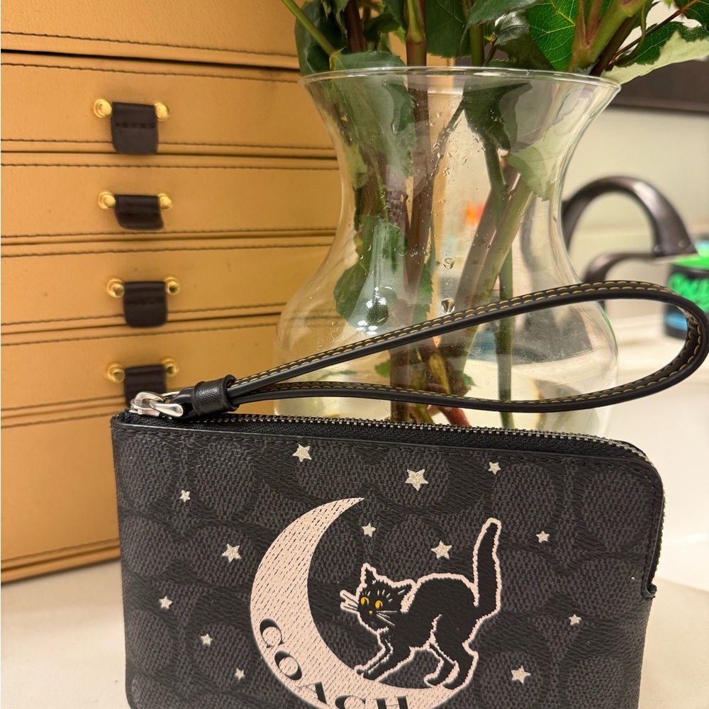 Coach Black Wristlet with Cat and Moon Design